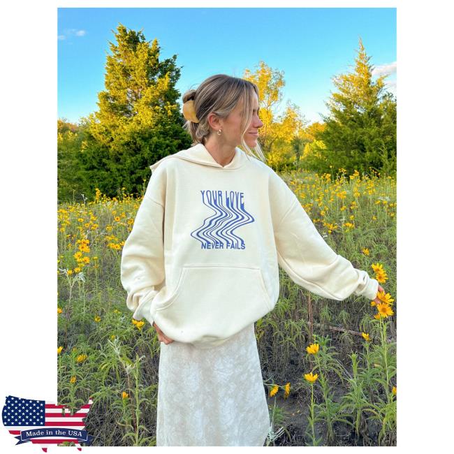 Official Elevated Faith Clothing Love Never Fails Cream Unisex Sweaters